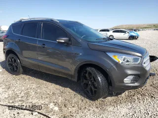 2019 Ford Escape Titanium with VIN 1FMCU0J95KUC27531, listed as a Copart auction lot 53879255 with 48,256 mi miles and Salvage Title. Bid and sale history available at carsss.com. Image 4.