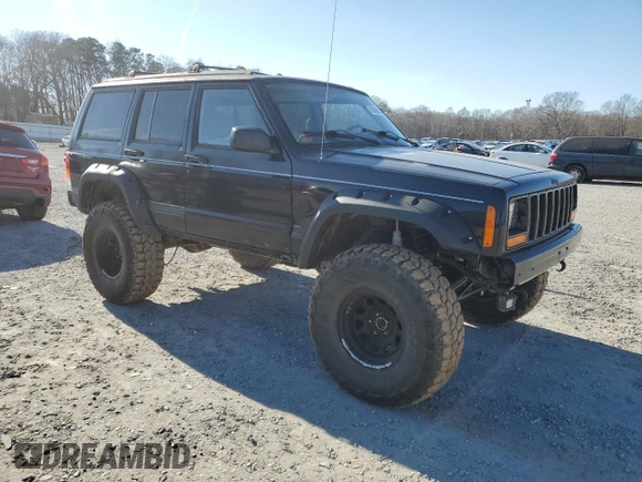 1997 Jeep Cherokee Country with VIN 1J4FJ78S2VL574492, listed as a Copart auction lot 88568685 with 244,465 mi miles and Salvage Title. Bid and sale history available at carsss.com. Image 4.