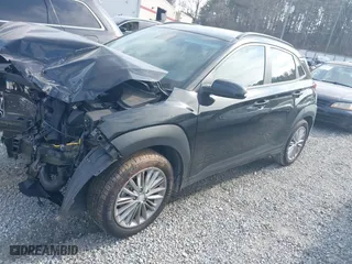 2021 Hyundai Kona SEL with VIN KM8K22AA1MU605029, listed as a IAAI auction lot 41478328 with 57,429 mi miles. Bid and sale history available at carsss.com. Image 17.
