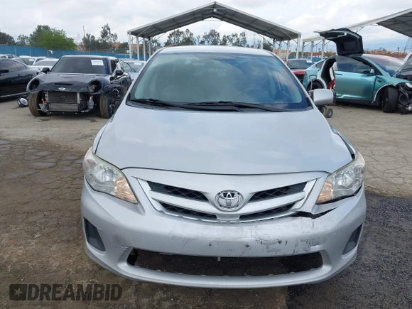 2012 Toyota Corolla L with VIN 2T1BU4EE9CC803165, listed as a IAAI auction lot 41924436 with 257,724 mi miles. Bid and sale history available at carsss.com. Image 12.