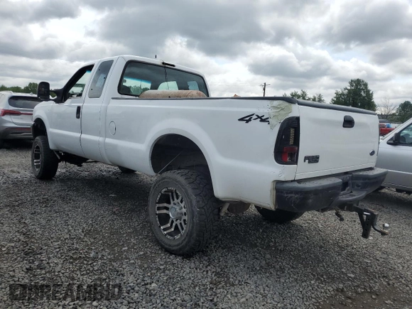 2004 Ford F-250 XL with VIN 1FTNX21P34ED08796, listed as a Copart auction lot 54789995 with 141,634 mi miles and Salvage title. Bid and sale history available at DreamBid. Image 2.