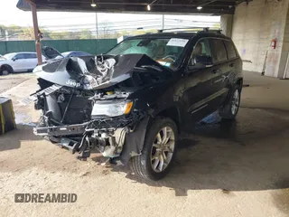 2016 Jeep Grand Cherokee Summit with VIN 1C4RJFJG7GC313252, listed as a IAAI auction lot 42172258 with 67,903 mi miles and . Bid and sale history available at DreamBid. Image 18.