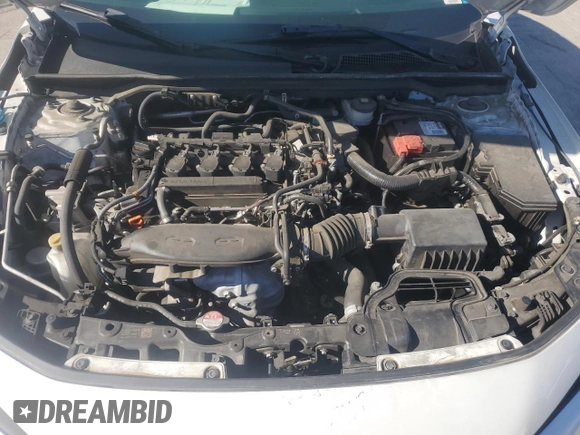 2022 Honda Civic Touring z VIN 2HGFE1F99NH301331, wystawiony jako Copart lot #57138065 z przebiegiem 77 788 mil mil oraz Szkoda całkowita • Salvage title. Historia ofert i sprzedaży dostępna na DreamBid. Obrazek 11.