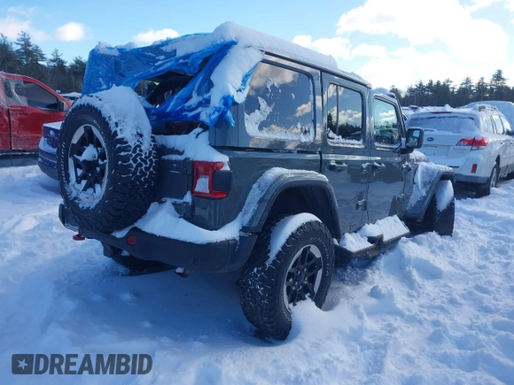 2020 Jeep Wrangler Unlimited Rubicon z VIN 1C4HJXFN5LW176104, wystawiony jako IAAI lot #41332511 z przebiegiem 70 428 mil mil oraz . Historia ofert i sprzedaży dostępna na DreamBid. Obrazek 4.