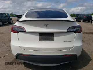 2022 Tesla Model Y Performance z VIN 7SAYGDEF4NF389191, wystawiony jako Copart lot #61443135 z przebiegiem 70 612 mil mil oraz Szkoda całkowita • Salvage title. Historia ofert i sprzedaży dostępna na DreamBid. Obrazek 6.