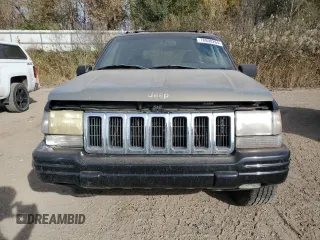 1998 Jeep Grand Cherokee Laredo with VIN 1J4GZ48YXWC299827, listed as a Copart auction lot 76898264 with 232,656 mi miles and Clean Title. Bid and sale history available at carsss.com. Image 5.