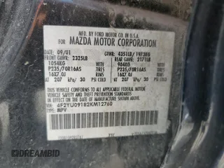 2002 Mazda Tribute LX with VIN 4F2YU09182KM12760, listed as a Copart auction lot 61292724 with 226,479 mi miles and Salvage Title. Bid and sale history available at carsss.com. Image 13.