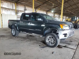 2006 Nissan Titan SE with VIN 1N6AA07B86N543212, listed as a Copart auction lot 45380035 with 186,431 mi miles and Salvage title. Bid and sale history available at DreamBid. Image 4.