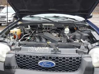 2005 Ford Escape XLT with VIN 1FMCU93125KA41795, listed as a IAAI auction lot 41931869 with 156,421 mi miles and . Bid and sale history available at DreamBid. Image 10.
