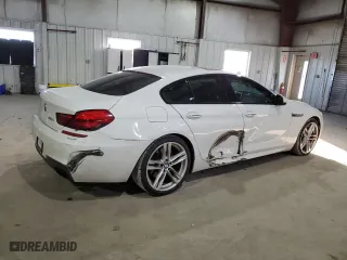 2015 BMW 6 Series 650i xDrive with VIN WBA6B4C56FD761374, listed as a Copart auction lot 41599334 with 63,057 mi miles and Salvage Title. Bid and sale history available at carsss.com. Image 3.