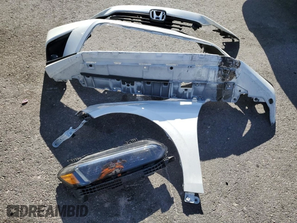 2023 Honda Civic Touring z VIN 2HGFE1F95PH314838, wystawiony jako Copart lot #52545085 z przebiegiem 29 863 mil mil oraz Szkoda całkowita • Salvage title. Historia ofert i sprzedaży dostępna na DreamBid. Obrazek 12.