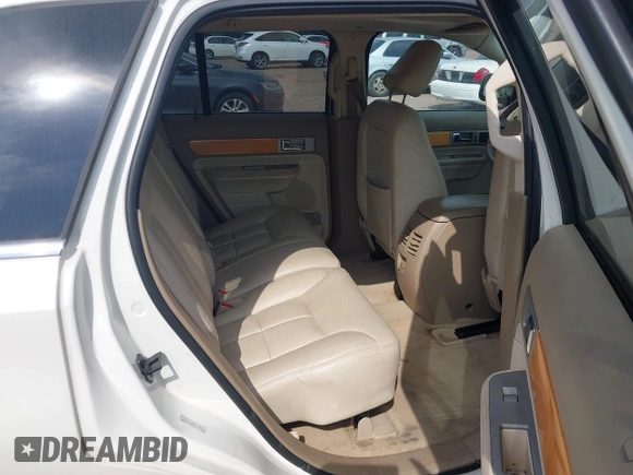 2007 Lincoln MKX with VIN 2LMDU68C87BJ31385, listed as a IAAI auction lot 42051347 with 279,933 mi miles and . Bid and sale history available at DreamBid. Image 8.