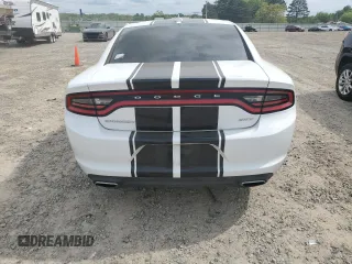 2015 Dodge Charger SXT with VIN 2C3CDXHGXFH865725, listed as a Copart auction lot 54217975 with 147,494 mi miles and Salvage Title. Bid and sale history available at DreamBid. Image 6.
