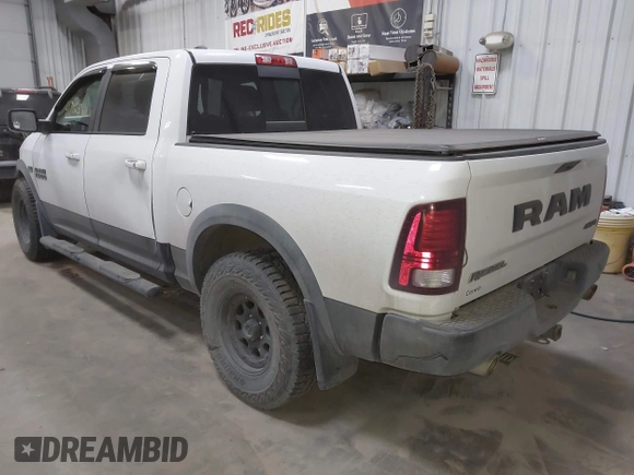 2016 Ram 1500 Rebel z VIN 1C6RR7YT6GS108472, wystawiony jako IAAI lot #41761560 z przebiegiem 101 132 mil mil oraz . Historia ofert i sprzedaży dostępna na DreamBid. Obrazek 3.