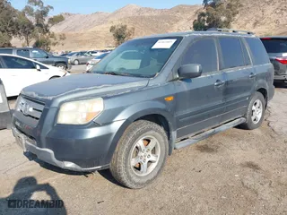 2006 Honda Pilot EX-L with RES with VIN 5FNYF28636B021196, listed as a IAAI auction lot 41461805 with 328,491 mi miles. Bid and sale history available at carsss.com. Image 2.