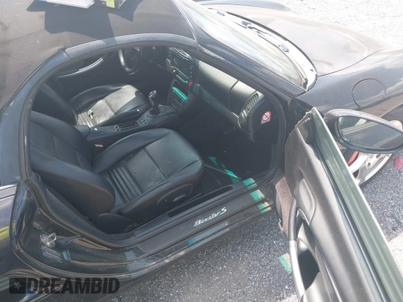 2002 Porsche Boxster S z VIN WP0CB29842U663272, wystawiony jako IAAI lot #42604562 z przebiegiem 68 927 mil mil oraz . Historia ofert i sprzedaży dostępna na DreamBid. Obrazek 5.