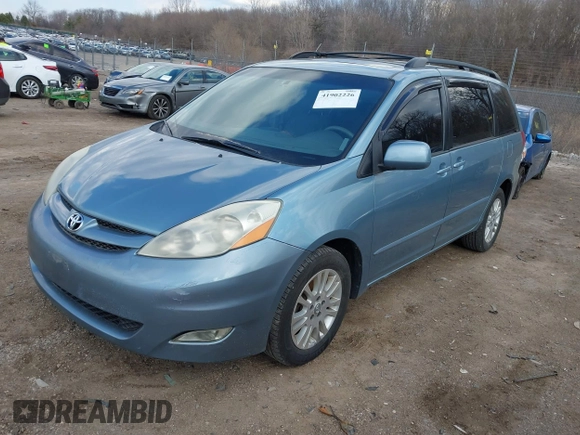2007 Toyota Sienna XLE with VIN 5TDZK22C37S053965, listed as a IAAI auction lot 41902226 with 239,910 mi miles. Bid and sale history available at carsss.com. Image 2.