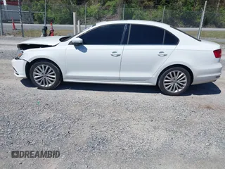 2015 Volkswagen Jetta SE with VIN 3VWD07AJ8FM284756, listed as a IAAI auction lot 42038453 with 127,112 mi miles and . Bid and sale history available at DreamBid. Image 14.