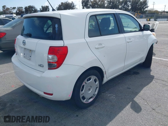 2010 Scion xD with VIN JTKKU4B48AJ053828, listed as a IAAI auction lot 41959804 with 255,337 mi miles. Bid and sale history available at carsss.com. Image 4.