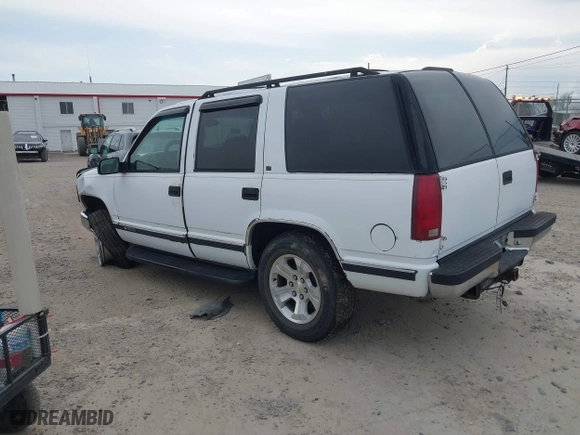 1997 Chevrolet Tahoe with VIN 1GNEK13R4VJ361515, listed as a IAAI auction lot 41768386 with 216,974 mi miles. Bid and sale history available at carsss.com. Image 3.