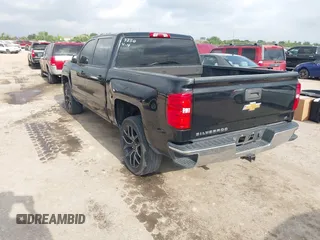 2015 Chevrolet Silverado 1500 LT with VIN 3GCPCREC3FG477250, listed as a IAAI auction lot 42150823 with 169,036 mi miles and . Bid and sale history available at DreamBid. Image 3.