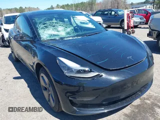 2022 Tesla Model 3 Long Range with VIN 5YJ3E1EB3NF104313, listed as a IAAI auction lot 41832803 with 39,061 mi miles and . Bid and sale history available at DreamBid. Image 6.