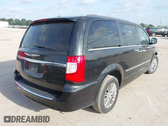 2013 Chrysler Town & Country Touring L with VIN 2C4RC1CG9DR778449, listed as a IAAI auction lot 42045779 with 217,776 mi miles and . Bid and sale history available at DreamBid. Image 4.