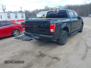 2015 Ford F-150 XLT with VIN 1FTEW1E8XFFB58716, listed as a IAAI auction lot 41854120 with 181,529 mi miles and . Bid and sale history available at DreamBid. Image 4.