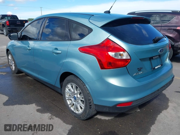 2012 Ford Focus SE with VIN 1FAHP3K24CL394495, listed as a IAAI auction lot 42034167 with 66,833 mi miles and . Bid and sale history available at carsss.com. Image 3.