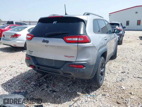 2017 Jeep Cherokee Trailhawk z VIN 1C4PJMBSXHW601720, wystawiony jako IAAI lot #42237975 z przebiegiem 92 239 mil mil oraz . Historia ofert i sprzedaży dostępna na DreamBid. Obrazek 4.