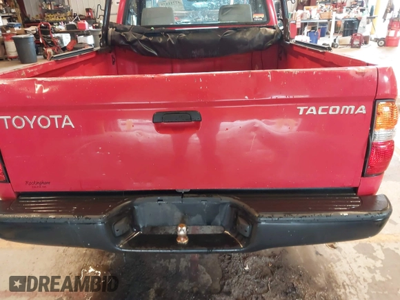 2001 Toyota Tacoma z VIN 5TENL42N31Z721220, wystawiony jako IAAI lot #42711573 z przebiegiem 213 157 mil mil oraz . Historia ofert i sprzedaży dostępna na DreamBid. Obrazek 14.