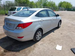 2014 Hyundai Accent GLS z VIN KMHCT4AE1EU637366, wystawiony jako IAAI lot #42455436 z przebiegiem 121 764 mil mil oraz . Historia ofert i sprzedaży dostępna na DreamBid. Obrazek 4.