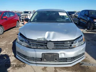 2015 Volkswagen Jetta SE z VIN 3VWD07AJ6FM326731, wystawiony jako IAAI lot #41066250 z przebiegiem 63 242 mil mil oraz . Historia ofert i sprzedaży dostępna na DreamBid. Obrazek 12.