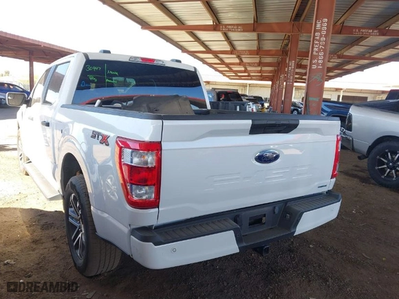 2023 Ford F-150 XL with VIN 1FTEW1CP7PKE28102, listed as a IAAI auction lot 41710708 with 31,563 mi miles. Bid and sale history available at carsss.com. Image 3.