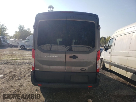 2015 Ford Transit with VIN 1FTNE1CM9FKA51425, listed as a Copart auction lot 70039184 with 146,782 mi miles and Salvage Title. Bid and sale history available at DreamBid. Image 6.