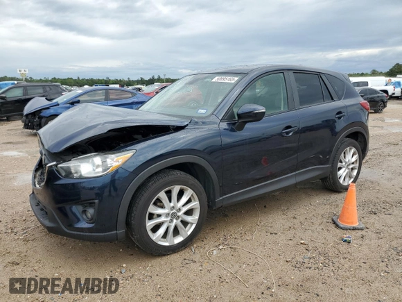 2015 Mazda CX-5 Grand Touring with VIN JM3KE2DY1F0466011, listed as a Copart auction lot 50695165 with 51,967 mi miles and Salvage Title. Bid and sale history available at carsss.com. Image 1.