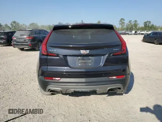 2022 Cadillac XT4 FWD Premium Luxury z VIN 1GYFZCR44NF151123, wystawiony jako Copart lot #50312745 z przebiegiem 46 820 mil mil oraz Szkoda całkowita • Salvage title. Historia ofert i sprzedaży dostępna na DreamBid. Obrazek 6.
