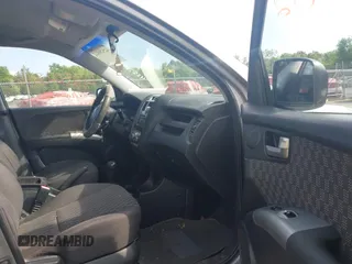 2006 Kia Sportage LX z VIN KNDJE723467218223, wystawiony jako IAAI lot #42520812 z przebiegiem 199 798 mil mil oraz . Historia ofert i sprzedaży dostępna na DreamBid. Obrazek 5.