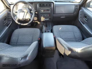 2001 Jeep Cherokee Sport with VIN 1J4FF48S61L617340, listed as a Copart auction lot 52340995 with 210,256 mi miles and Clean Title. Bid and sale history available at carsss.com. Image 8.