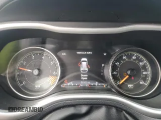 2015 Jeep Cherokee Trailhawk with VIN 1C4PJMBB1FW630715, listed as a Copart auction lot 58559675 with 58,302 mi miles and Salvage title. Bid and sale history available at DreamBid. Image 9.