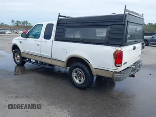 1999 Ford F-150 XL with VIN 1FTRX18LXXNA16159, listed as a IAAI auction lot 41746440 with 999,999 mi miles. Bid and sale history available at carsss.com. Image 3.