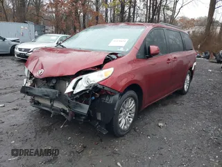 2014 Toyota Sienna XLE with VIN 5TDYK3DC0ES510579, listed as a IAAI auction lot 41470424 with 304,620 mi miles and . Bid and sale history available at DreamBid. Image 18.