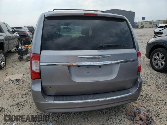 2014 Chrysler Town & Country Touring with VIN 2C4RC1BGXER395493, listed as a Copart auction lot 64263214 with 142,844 mi miles and Salvage Title. Bid and sale history available at DreamBid. Image 6.