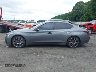 2021 Infiniti Q50 Red Sport 400 with VIN JN1FV7DR2MM880505, listed as a IAAI auction lot 42377058 with 59,618 mi miles and . Bid and sale history available at DreamBid. Image 14.
