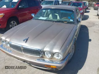 1998 Jaguar XJ Vanden Plas with VIN SAJKX6242WC823240, listed as a IAAI auction lot 41605734 with Not Provided miles and . Bid and sale history available at DreamBid. Image 6.