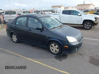 2003 Suzuki Aerio S z VIN JS2RA41S135158128, wystawiony jako IAAI lot #41425178 z przebiegiem 166 019 mil mil oraz . Historia ofert i sprzedaży dostępna na DreamBid. Obrazek 1.