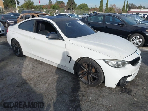 2014 BMW 4 Series 428i with VIN WBA3N3C5XEF710869, listed as a IAAI auction lot 40984116 with 115,958 mi miles and . Bid and sale history available at DreamBid. Image 1.