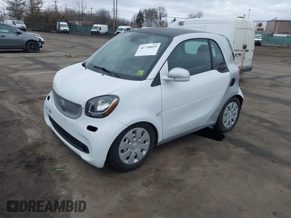 2016 Smart fortwo Passion with VIN WMEFJ5DA9GK046904, listed as a IAAI auction lot 41730029 with 143,301 mi miles and . Bid and sale history available at DreamBid. Image 2.