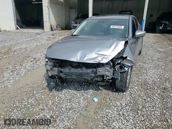 2015 Mazda 3 i Grand Touring z VIN 3MZBM1W7XFM155147, wystawiony jako Copart lot #58413555 z przebiegiem 111 318 mil mil oraz Szkoda całkowita • Salvage title. Historia ofert i sprzedaży dostępna na DreamBid. Obrazek 14.