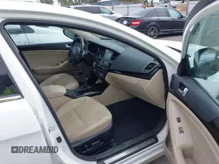 2016 Kia Cadenza Premium with VIN KNALN4D77G5218198, listed as a IAAI auction lot 40381356 with 77,116 mi miles. Bid and sale history available at carsss.com. Image 5.